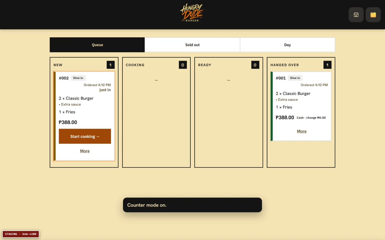 The counter queue: New, Cooking, Ready and Handed over, with one card per order.